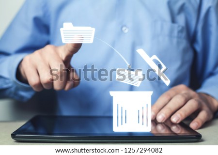 Man hand touching on file. Deleting files