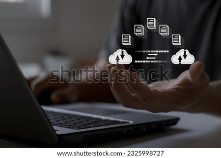 Man hand transferring files in virtual screen for Send of document on internet. Data transfer, Transfer file of data between folder, Backup data, Exchange of file on folder, DMS. Virtual document.