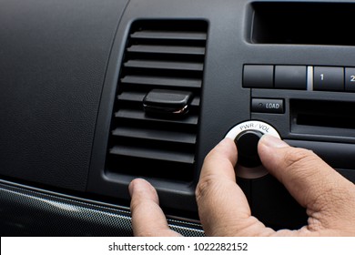 A Man Hand Turn Up The Volume Sound Radio In Car  