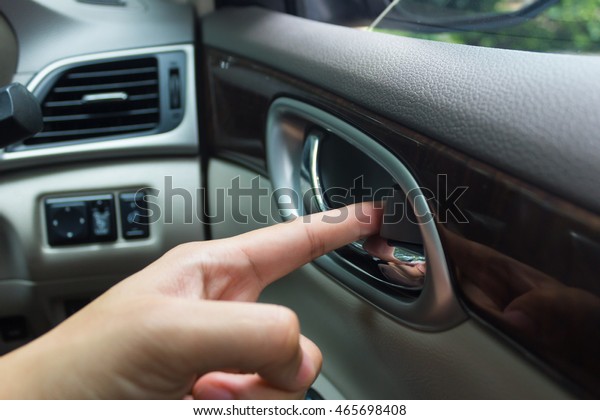 man hand\
use the signal switch. Car interior\
detail