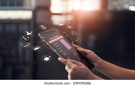 Man hand using online banking and icon on tablet screen device in coffee shop. Technology E-commerce Commercial. Online payment digital and shopping on network connection.  - Shutterstock ID 1099395086
