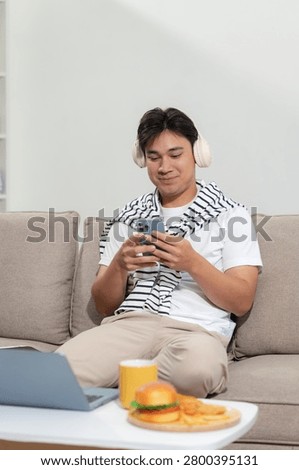 Man hand using smart phones, mobile payments, online shopping.	