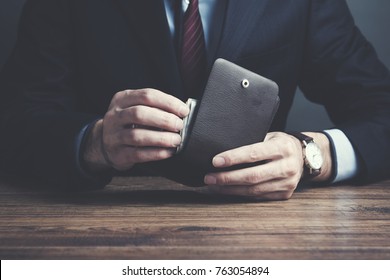 Man Hand Wallet And Money On Table