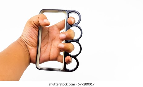 Man Hand Wear Knuckle Ring Mobile Case In Varnish Black Color Isolated