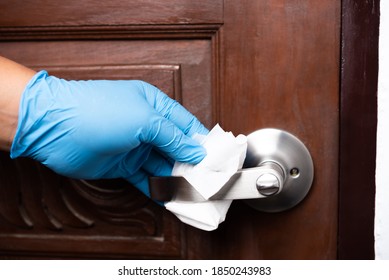 Man Hand Wear Rubber Glove Cleaning Door Knob