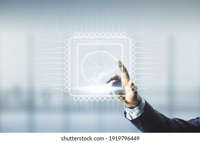 Man hand working with virtual creative artificial Intelligence hologram with human brain sketch on blurred office background. Multiexposure