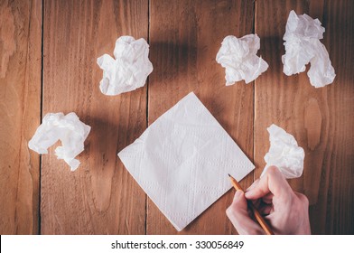 Man Hand Writing Notes On Paper Napkin