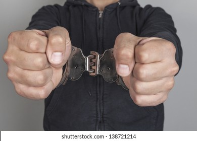 Man with handcuffs on his hands
