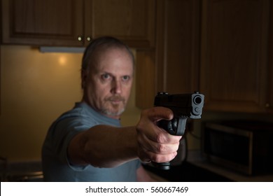 Man Handgun Dark Kitchen Gun Focus Stock Photo Edit Now 560667469