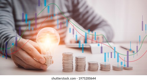 Man hand-holding light bulb and working with a computer on the desk, Creativity, and innovation are keys to success. Concept of new idea and innovation with Brain and light bulbs - Powered by Shutterstock