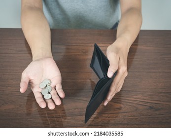 Man Hands Hold Empty Wallet No Money With Coins On The Table