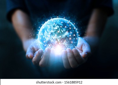 Man hands holding blue earth and global networking connection and data exchanges, global communication network concept, Elements of this image furnished by NASA.