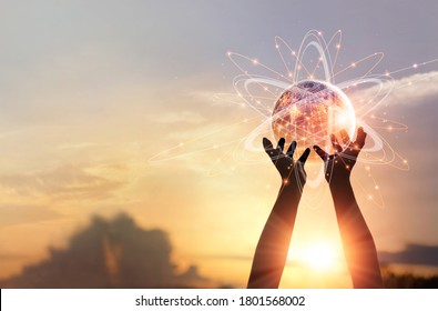 Man hands holding global network and data customer connection, Abstract science, on nature background. Elements of this image furnished by NASA