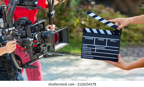 Man Hands Holding Movie Clapper. Film Director Concept. Camera Show Viewfinder Image Catch Motion In Interview Or Broadcast Wedding Ceremony, Catch Feeling, Stop Motion In Best Memorial Day Concept.