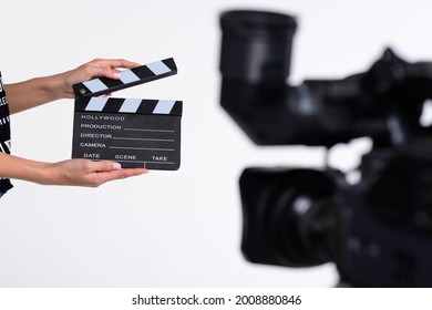 Man hands holding movie clapper.Film director concept.camera show viewfinder image catch motion in interview or broadcast wedding ceremony, catch feeling, stopped motion in best memorial day concept.