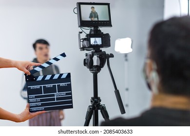 Man hands holding movie clapper.Film director concept.camera show viewfinder image catch motion in interview or broadcast wedding ceremony, catch feeling, stopped motion in best memorial day concept.	