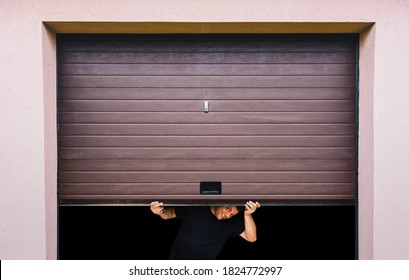 Man With Hands Holds Pvc Garage Door 