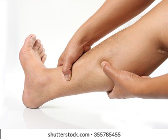 Man Hands Leg Massage For Pain Relief On A White Background.