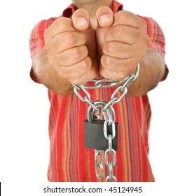 Man hands in massive chains with padlock - closeup
