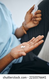 Man hands, medicine pills and medical tablet treatment for sick, healthcare and pharmaceutical drugs help. Closeup person daily capsules of antibiotics, wellness vitamins and pain healing supplements - Shutterstock ID 2210376641