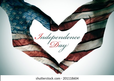 man hands patterned with the flag of the United States forming a heart and the sentence independence day - Shutterstock ID 201118604