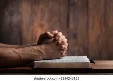 Man hands praying on the bible. Concept religion - Shutterstock ID 2284246165