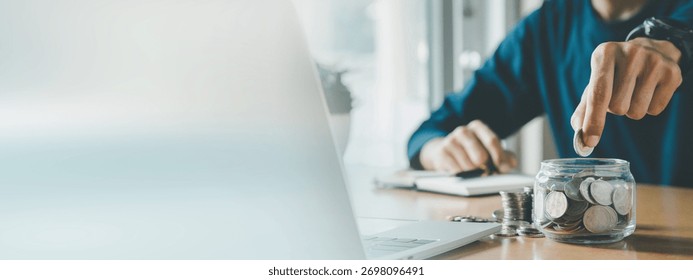 Man hands putting coins stack, Concept business finance saving money and investment.