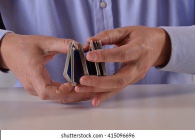 Man Hands Shuffling Game Cards