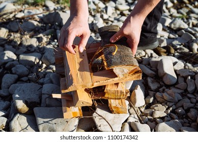 Man Hands Spread The Fire. Hiking Concept. Coocking On Nature