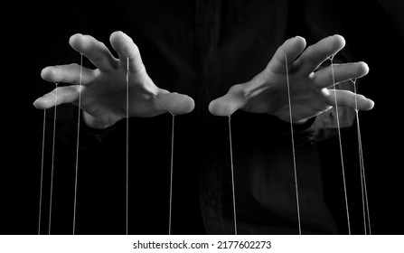 Man hands with strings on fingers. Negative abusive relationship, manipulation, control, power concept. Black and white. High quality photo - Shutterstock ID 2177602273