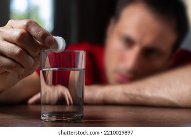 Man With Hangover Taking Medicine Pill Cure.