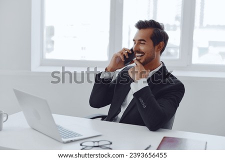 Man happy laptop smile talk business manager working businessman computer phone white office young