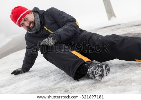 Man has an accident on a icy Street