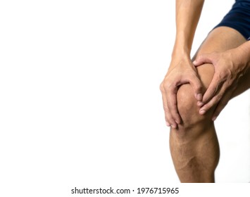 Man has knee pain after exercising, on white background, Space for text - Shutterstock ID 1976715965