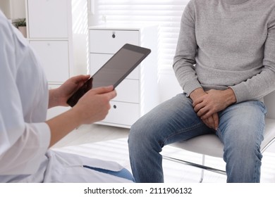 Man Having Appointment With STD Specialist In Clinic, Closeup