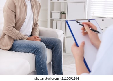 Man Having Appointment With STD Specialist In Clinic, Closeup