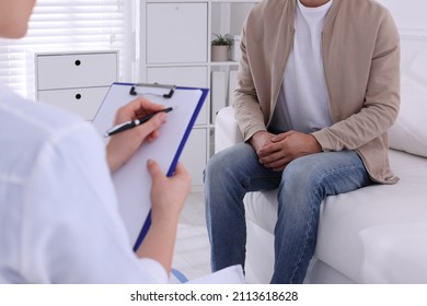 Man Having Appointment With STD Specialist In Clinic, Closeup