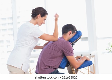 Man having back massage in medical office
