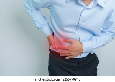 man having back pain. Urinary system and Stones, Cancer, world kidney day, Chronic kidney stomach, liver pain and pancreas concept - Shutterstock ID 2256999943