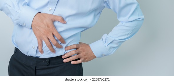 man having back pain. Urinary system and Stones, Cancer, world kidney day, Chronic kidney stomach, liver pain and pancreas concept - Shutterstock ID 2258760271