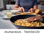  Man having a breakfast in the kitchen                              