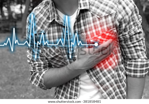 Man having\
chest pain - heart attack,\
outdoors