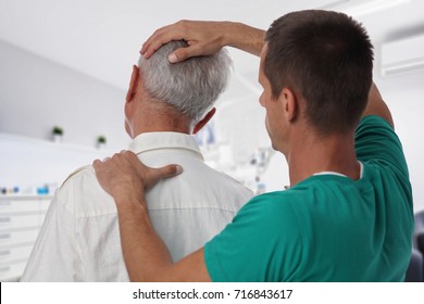 Man having chiropractic back and neck adjustment. Osteopathy, Alternative medicine, pain relief concept. Physiotherapy, sport injury rehabilitation - Powered by Shutterstock