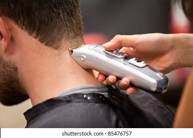 Man Having A Haircut With A Hair Clippers
