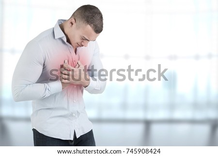 Man having a pain in the heart area