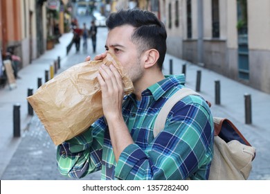 Man Having A Panic Attack In The Crowd