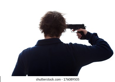 A man having a suicidal attempt with a pistol