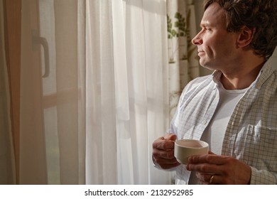 Man having teatime in the morning before work