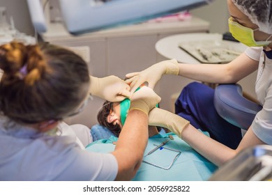 Man Having Teeth Examined At Dentists. Dental Treatment In Dentistry. Appointment At The Dentist. Lifestyle, Real Life