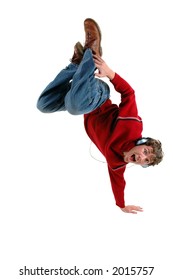 A Man With Headphones On Doing A Back Flip